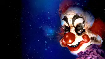 Backdrop to the movie "Killer Klowns from Outer Space" #878418