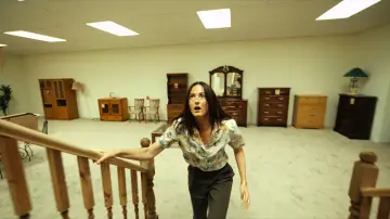 Backdrop to the movie "Backrooms" #1570023