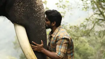Backdrop to the movie "Kumki 2" #1296269