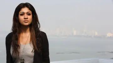 Backdrop to the movie "Arrambam" #1580484