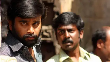 Backdrop to the movie "Naadodigal" #713300
