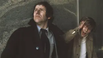 Backdrop to the movie "Man on the Roof" #197763