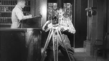 Backdrop to the movie "Man with a Movie Camera" #1634259