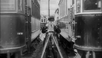 Backdrop to the movie "Man with a Movie Camera" #1634260