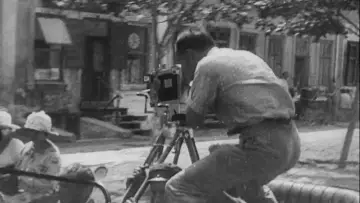 Backdrop to the movie "Man with a Movie Camera" #1634261