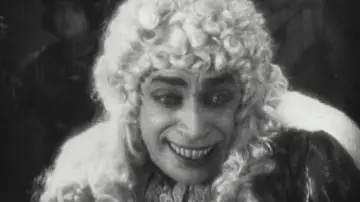 Backdrop to the movie "The Man Who Laughs" #1080089