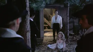 Backdrop to the movie "Twins of Evil" #1049946