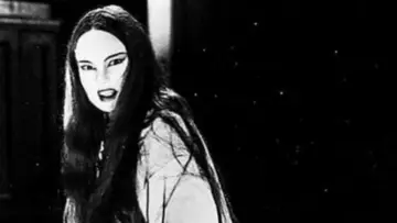 Backdrop to the movie "Mark of the Vampire" #1579112