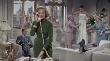 Backdrop to the movie "Designing Woman" #1133885