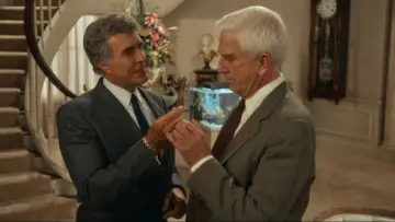 Backdrop to the movie "The Naked Gun: From the Files of Police Squad!" #1630254