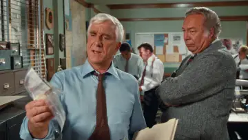 Backdrop to the movie "The Naked Gun: From the Files of Police Squad!" #1630259