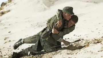 Backdrop to the movie "Land of Mine" #1900526