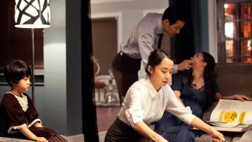 Backdrop to the movie "The Housemaid" #384034