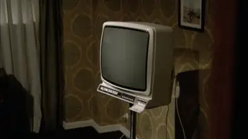 Backdrop to the movie "El televisor" #1928024