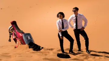 Backdrop to the movie "Men in Black: International" #318527