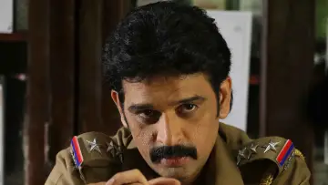 Marainthirunthu Paarkum Marmam Enna Poster