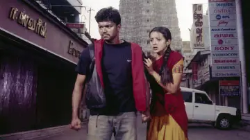 Backdrop to the movie "Ghilli" #1100791