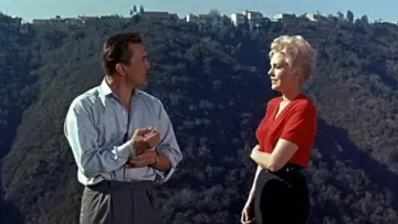 Backdrop to the movie "Strangers When We Meet" #1856197