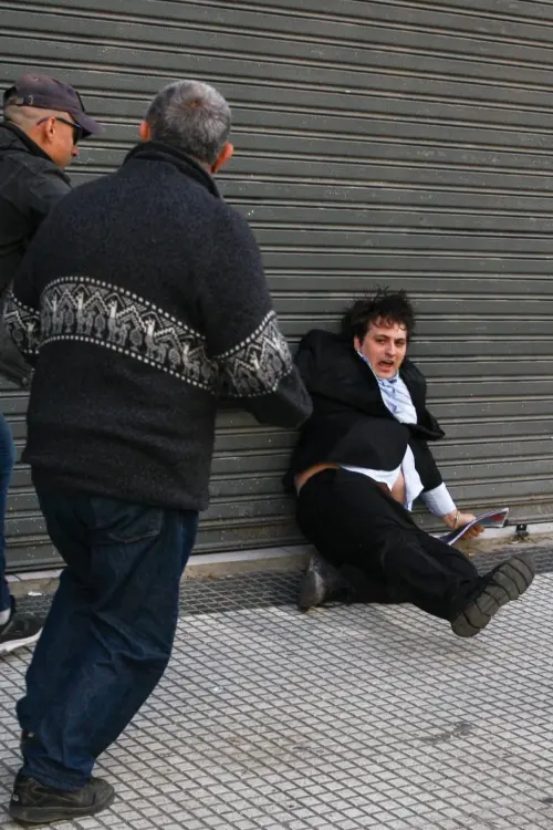 Movie poster "fran fijap running from leftists into a pizza shop"