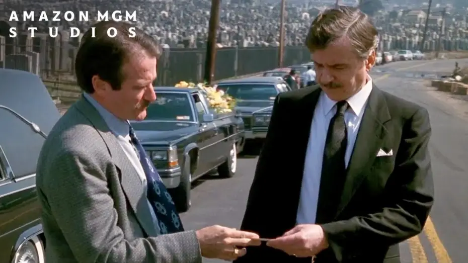 Watch film Cadillac Man — Selling A Car At A Funeral