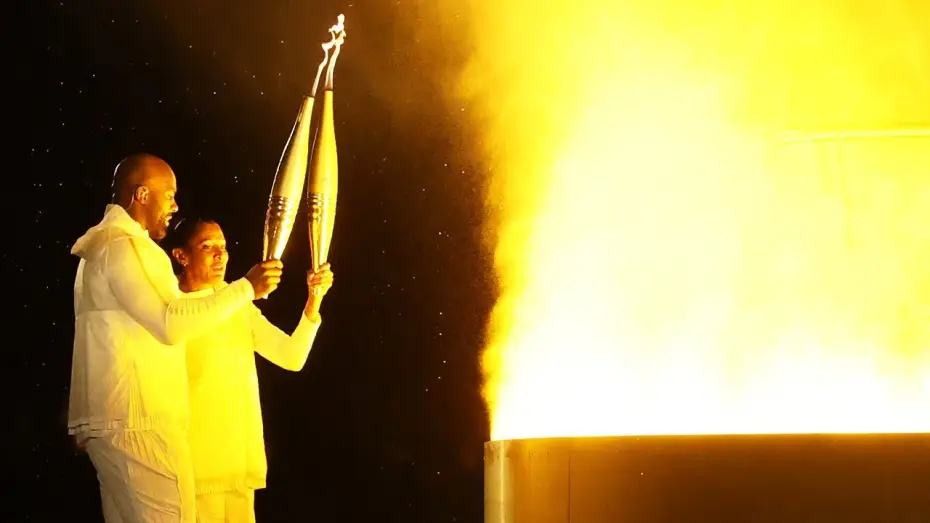 Watch film Paris 2024 Olympic Opening Ceremony — JO PARIS 2024 - Marie-José Pérec et Teddy Riner allument ensemble la vasque olympique qui s'envole