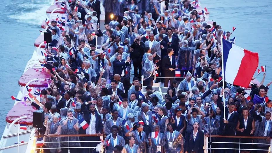 Watch film Paris 2024 Olympic Opening Ceremony — JO PARIS 2024 - Le bateau de l'Équipe de France défile au son de "Que je t'aime" de Johnny