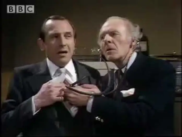 Video for the series The Thin Blue Line — Reggie Perrin visits doctor