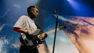 Backdrop for the TV series "Twenty One Pilots: The Clancy World Tour Series" #1488113